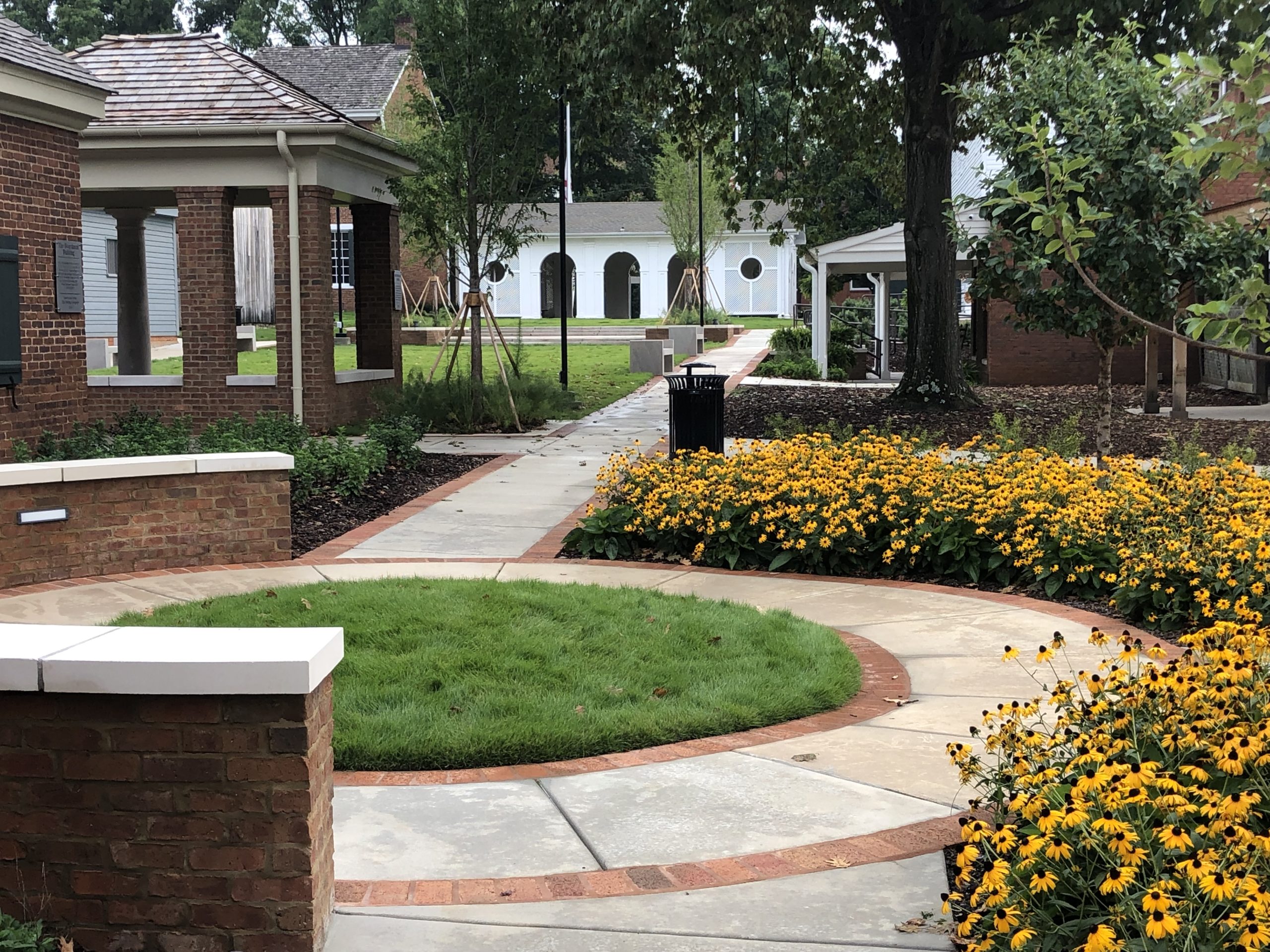 circle walkway at constitution village with flowers