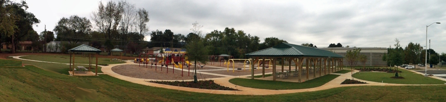 panorama image of playground and pavilion at optimist park